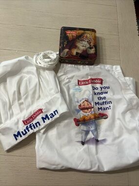 Collectible Little Debbie Muffin Man Chef’s Hat & Apron With Bonus Santa Tin